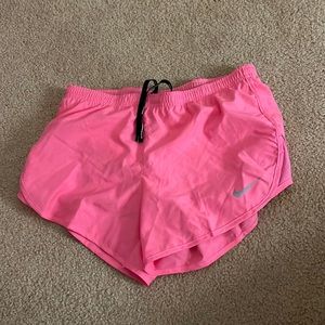 Neon Pink Nike shorts! Adjustable waste, pocket in the back!